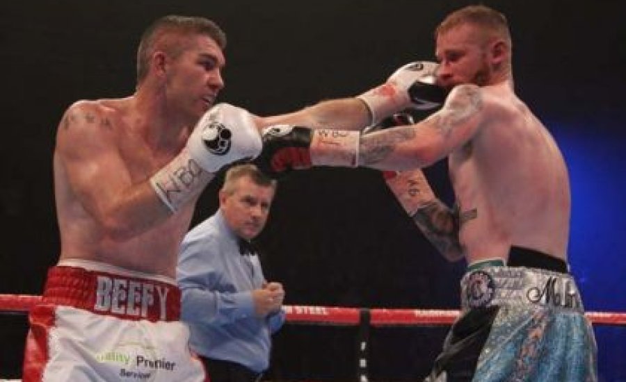 Smith megvédte vb-övét Kelly ellen